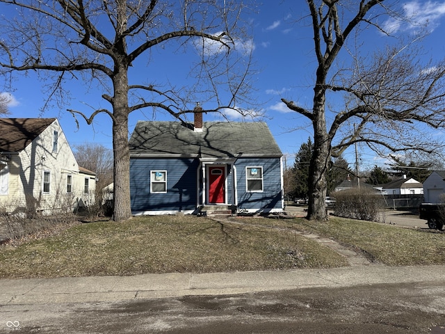 view of front of home with a chimney