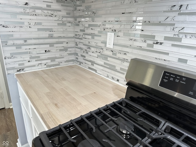 interior details with stainless steel range with gas stovetop