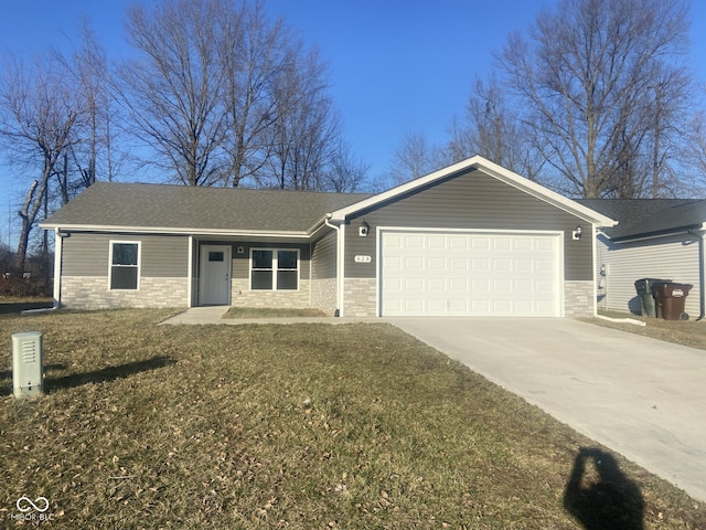 single story home with a shingled roof, a front yard, concrete driveway, and an attached garage