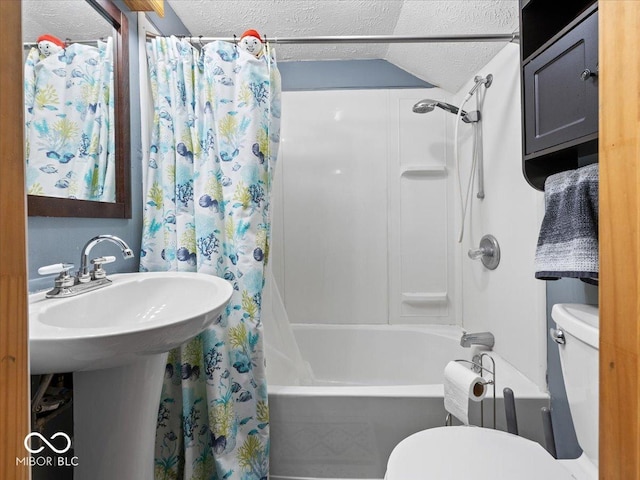 bathroom with toilet, shower / bath combo, vaulted ceiling, and a textured ceiling