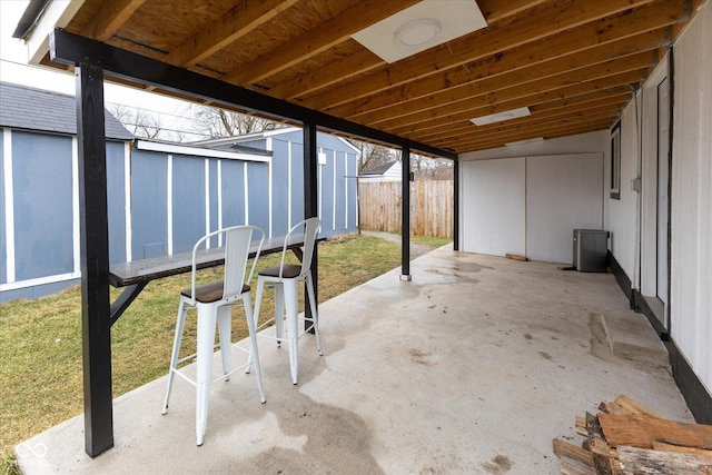 view of patio / terrace featuring fence