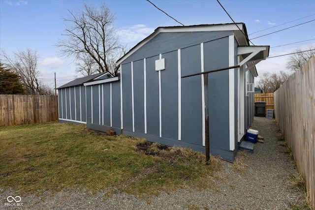 view of outbuilding featuring a fenced backyard