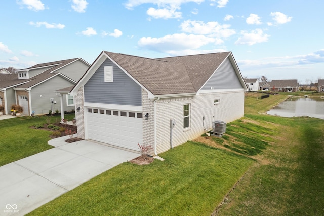 view of side of property with central AC, brick siding, concrete driveway, a lawn, and roof with shingles