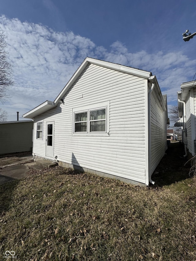 back of property featuring a patio