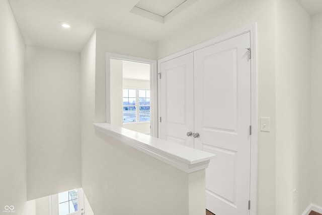 hall featuring recessed lighting