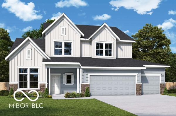 view of front of property with board and batten siding, stone siding, a front lawn, and concrete driveway