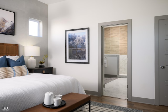 bedroom featuring ensuite bath, wood finished floors, and baseboards