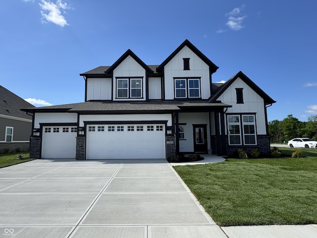 15871 Vitalize Run, Fishers, IN 46040 - view of front facade featuring a front yard, driveway, board and batten siding, and an attached garage