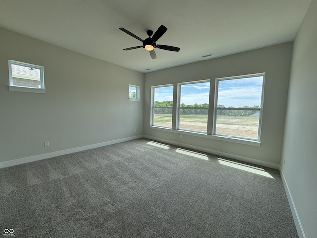 15871 Vitalize Run, Fishers, IN 46040 - unfurnished room featuring baseboards, a ceiling fan, and carpet floors