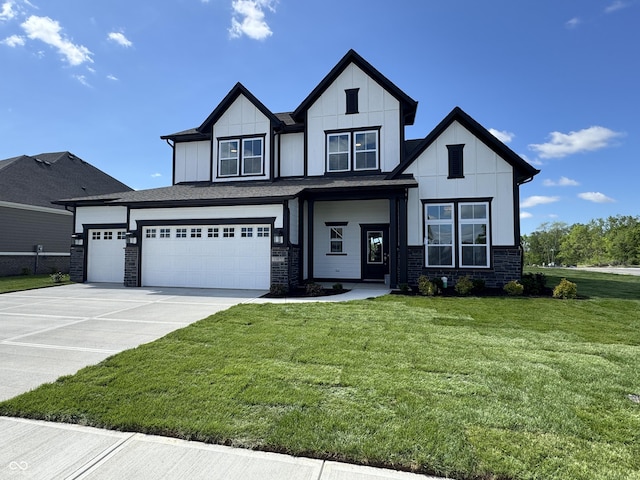 15871 Vitalize Run, Fishers, IN 46040 - view of front facade featuring a front yard, board and batten siding, driveway, a garage, and stone siding