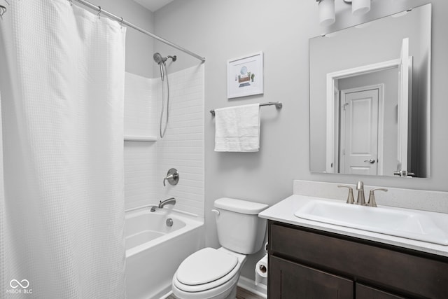 bathroom featuring shower / bath combo with shower curtain, vanity, and toilet