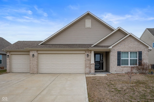 view of front of home featuring a garage, brick siding, driveway, and roof with shingles