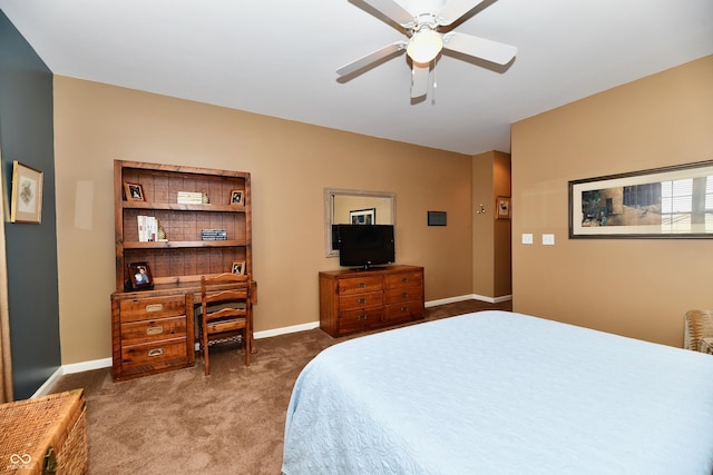 carpeted bedroom featuring a ceiling fan and baseboards