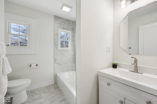 3645 N Delaware St, Indianapolis, IN 46205 - bathroom featuring baseboards, toilet, marble finish floor, and vanity