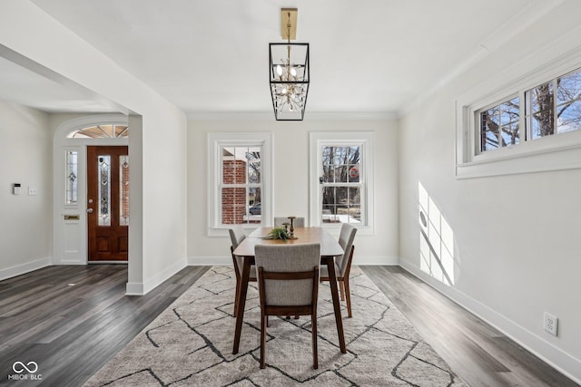 3645 N Delaware St, Indianapolis, IN 46205 - dining space featuring plenty of natural light, baseboards, and wood finished floors