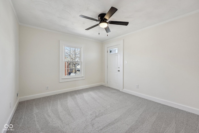 3645 N Delaware St, Indianapolis, IN 46205 - carpeted empty room with crown molding, a ceiling fan, and baseboards