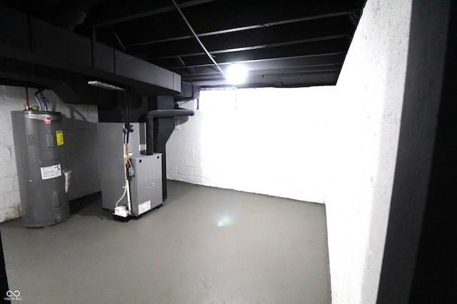 3645 N Delaware St, Indianapolis, IN 46205 - below grade area featuring heating unit and electric water heater