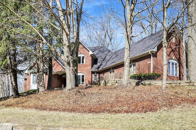 traditional home with brick siding