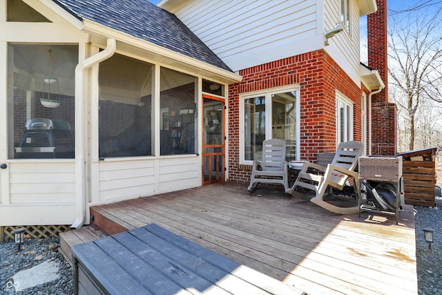 deck featuring a sunroom