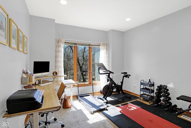 office space with recessed lighting and baseboards