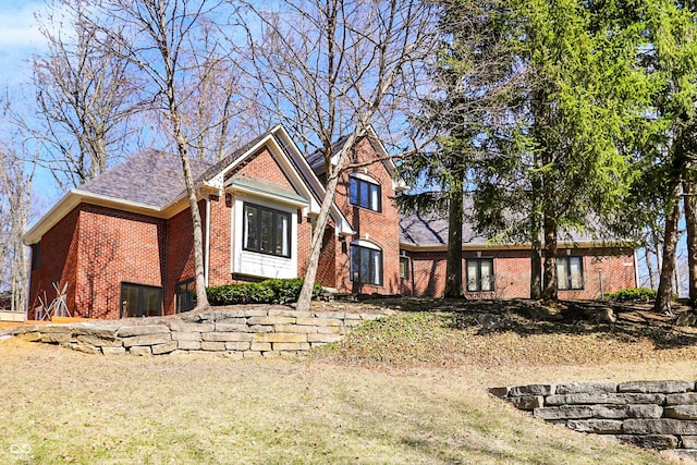 view of front facade featuring brick siding