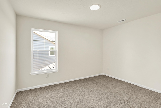 7168 Jackson Dr, Cumberland, IN 46229 - spare room featuring visible vents, baseboards, and carpet