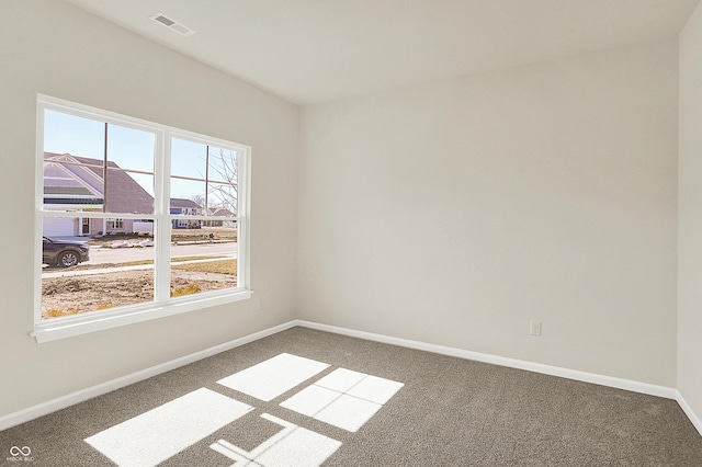 7168 Jackson Dr, Cumberland, IN 46229 - empty room featuring visible vents, carpet, and baseboards