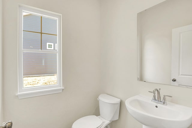 7168 Jackson Dr, Cumberland, IN 46229 - bathroom featuring a sink and toilet