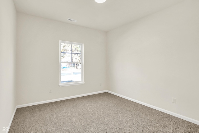 7168 Jackson Dr, Cumberland, IN 46229 - carpeted empty room with visible vents and baseboards