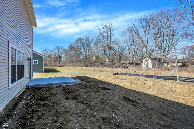7168 Jackson Dr, Cumberland, IN 46229 - view of yard featuring a patio