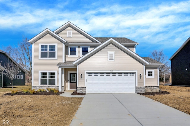 view of front facade with stone siding, concrete driveway, an attached garage, and a shingled roof