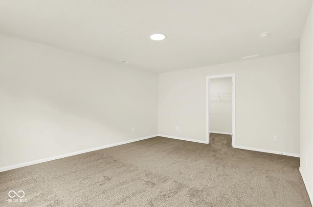7168 Jackson Dr, Cumberland, IN 46229 - spare room with carpet flooring, recessed lighting, and a smoke detector