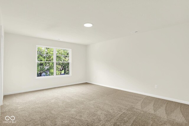 7168 Jackson Dr, Cumberland, IN 46229 - carpeted spare room with baseboards