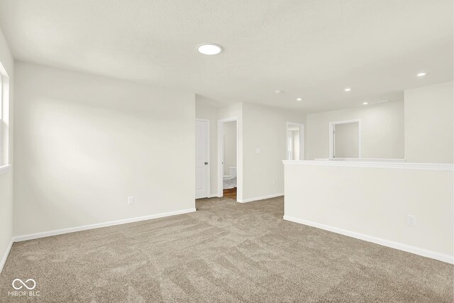 7168 Jackson Dr, Cumberland, IN 46229 - carpeted empty room featuring recessed lighting