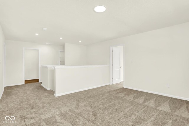 7168 Jackson Dr, Cumberland, IN 46229 - carpeted empty room with recessed lighting and baseboards