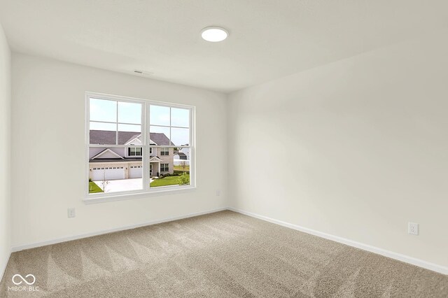 7168 Jackson Dr, Cumberland, IN 46229 - spare room featuring carpet