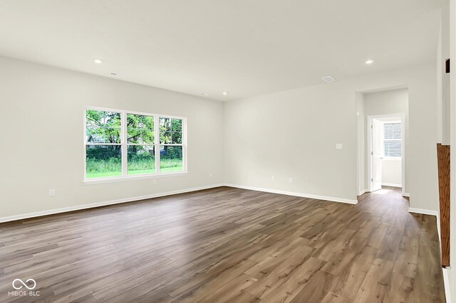 7168 Jackson Dr, Cumberland, IN 46229 - unfurnished room featuring wood finished floors and recessed lighting
