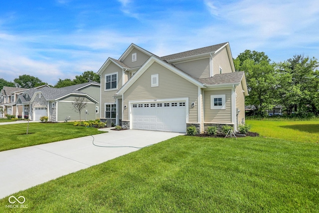 7168 Jackson Dr, Cumberland, IN 46229 - traditional-style home featuring a front lawn, driveway, an attached garage, and stone siding