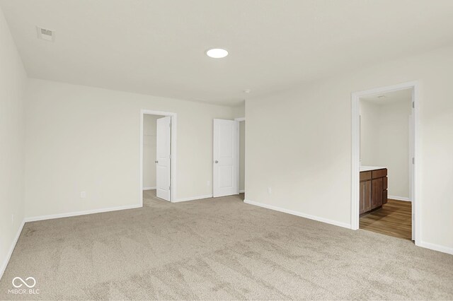 7168 Jackson Dr, Cumberland, IN 46229 - carpeted empty room with baseboards