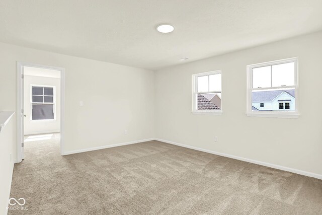 7168 Jackson Dr, Cumberland, IN 46229 - carpeted spare room featuring baseboards