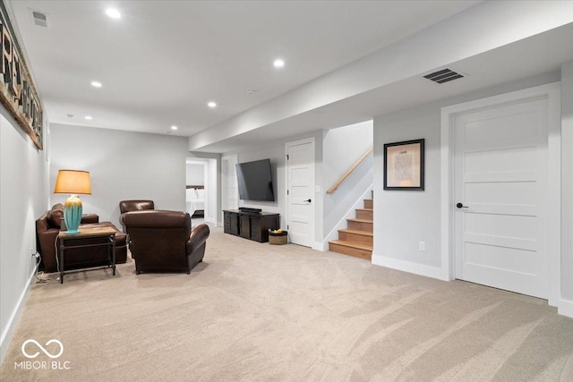 2026 Alvord St, Indianapolis, IN 46202 - living room with visible vents, baseboards, recessed lighting, stairs, and light colored carpet