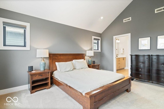 2026 Alvord St, Indianapolis, IN 46202 - carpeted bedroom featuring multiple windows, baseboards, and visible vents