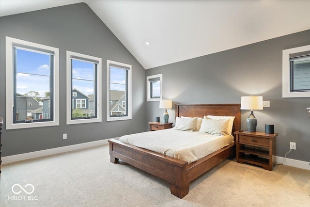 2026 Alvord St, Indianapolis, IN 46202 - carpeted bedroom with baseboards and high vaulted ceiling