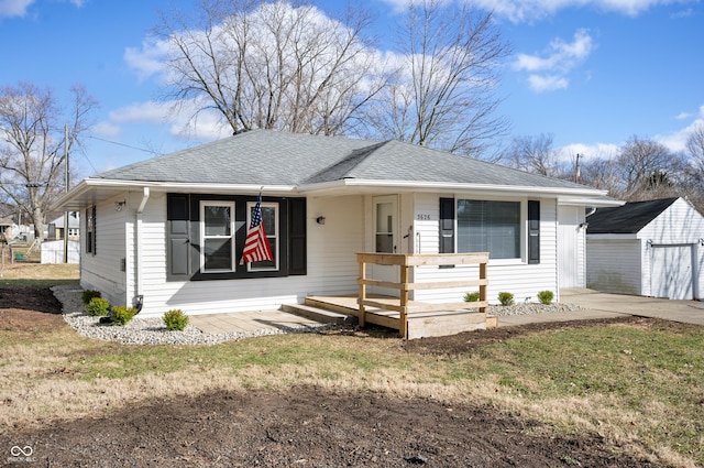 bungalow featuring a porch and a shingled roof