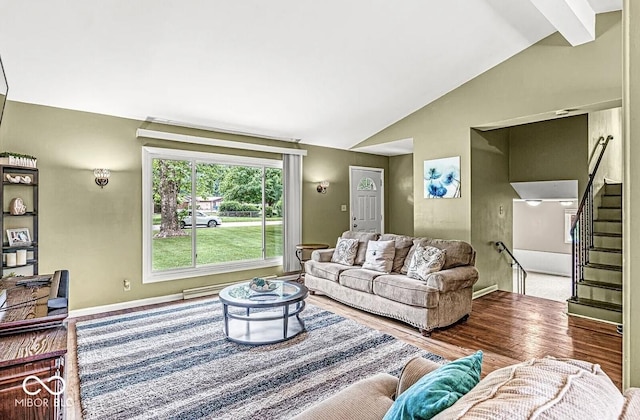 living room with stairway, baseboards, lofted ceiling, and wood finished floors