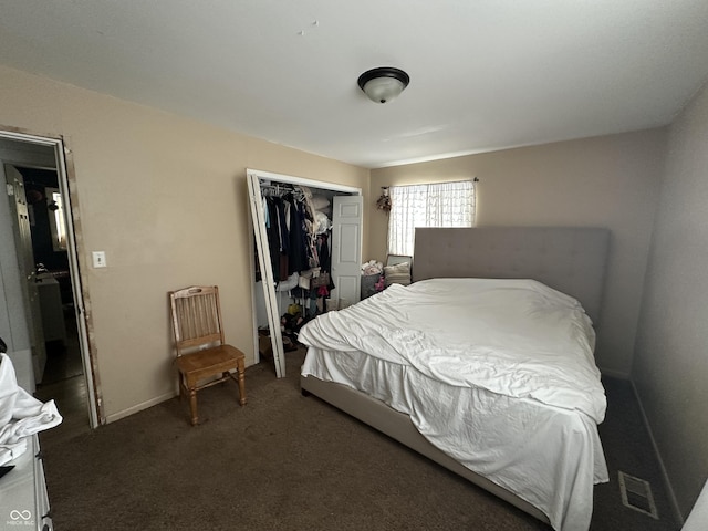 bedroom with carpet floors, a closet, visible vents, and baseboards