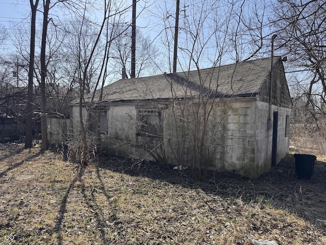 exterior space with concrete block siding