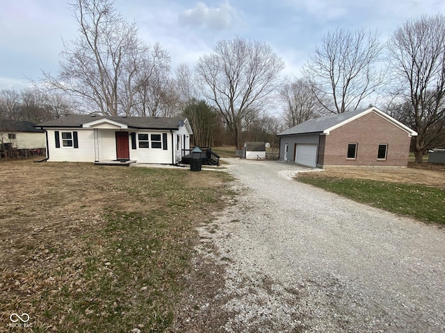 exterior space featuring gravel driveway