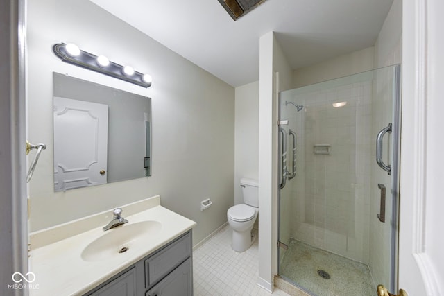 bathroom with toilet, a stall shower, tile patterned flooring, and vanity