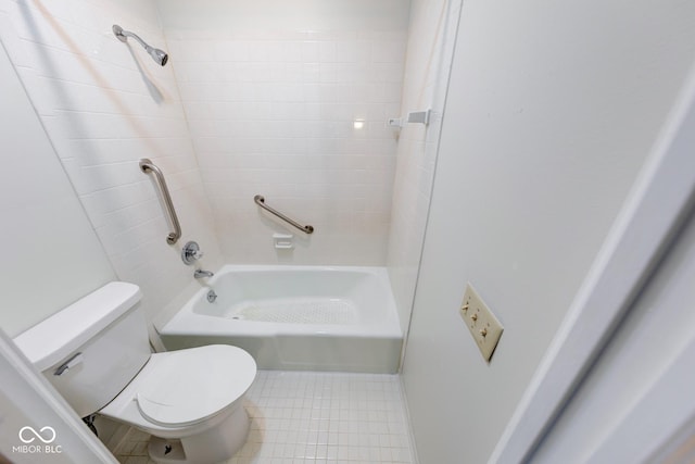 full bath featuring  shower combination, tile patterned flooring, and toilet